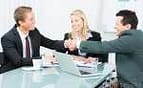 men shaking hands at business meeting